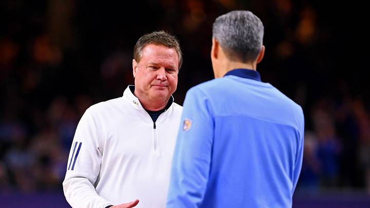 Apr 2, 2022; New Orleans, LA, USA; Kansas Jayhawks head coach Bill Self shakes hands with Villanova Wildcats head coach Jay Wright after the game during the 2022 NCAA men's basketball tournament Final Four semifinals at Caesars Superdome.