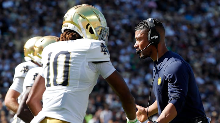 Notre Dame Fighting Irish head coach Marcus Freeman high-fives Notre Dame Fighting Irish wide receiver Kris Mitchell (10) Saturday, Sept. 14, 2024, during the NCAA football game against the Purdue Boilermakers at Ross-Ade Stadium in West Lafayette, Ind. Notre Dame Fighting Irish head coach Marcus Freeman high-fives Notre Dame Fighting Irish wide receiver Kris Mitchell (10) Saturday, Sept. 14, 2024, during the NCAA football game against the Purdue Boilermakers at Ross-Ade Stadium in West Lafayette, Ind.