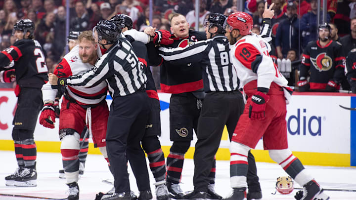 Apr 25, 2026; Ottawa, Ontario, CAN; Tensions rise as Carolina Hurricanes left wing Nicolas Deslauriers (44) fights with Ottawa Senators left wing Brady Tkachuk (7) in the second period of game four of the first round of the 2026 Stanley Cup Playoffs at the Canadian Tire Centre. Mandatory Credit: Marc DesRosiers-Imagn