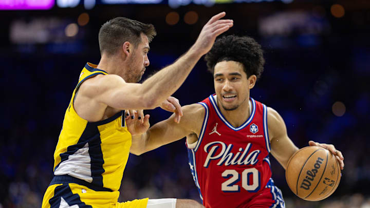 Dec 13, 2024; Philadelphia, Pennsylvania, USA; Philadelphia 76ers guard Jared McCain (20) and Indiana Pacers guard T.J. McConnell (9) in action at Wells Fargo Center. Mandatory Credit: Bill Streicher-Imagn Images
