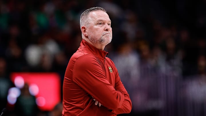 Jan 7, 2025; Denver, Colorado, USA; Denver Nuggets head coach Michael Malone looks on in the first quarter against the Boston Celtics at Ball Arena. Mandatory Credit: Isaiah J. Downing-Imagn Images