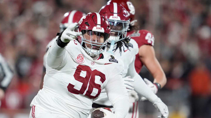Alabama Crimson Tide defensive lineman Tim Keenan III (96) celebrates after blocking a punt during a first-round College Football Playoff game between the University of Oklahoma Sooners (OU) and the Alabama Crimson Tide at Gaylord Family – Oklahoma Memorial Stadium in Norman, Okla., Friday, Dec. 19, 2025. Alabama won 34-24.