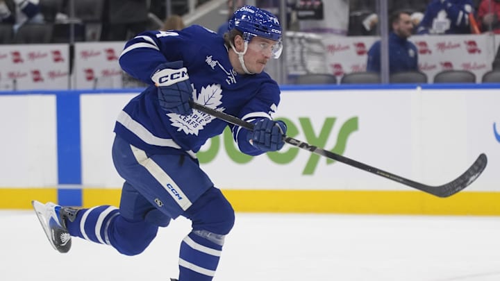 Jan 27, 2026; Toronto, Ontario, CAN; Toronto Maple Leafs forward Bobby McMann (74) shoots the puck during warm up before a game against the Buffalo Sabres at Scotiabank Arena. Mandatory Credit: John E. Sokolowski-Imagn Images