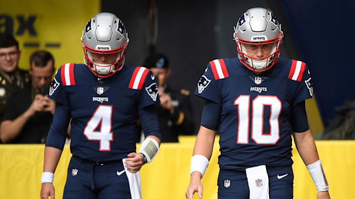 Nov 6, 2022; Foxborough, Massachusetts, USA;  New England Patriots quarterback Bailey Zappe (4) and