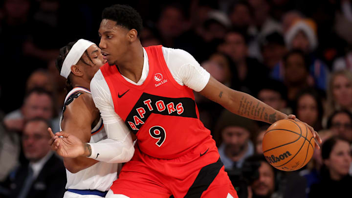 Dec 23, 2024; New York, New York, USA; Toronto Raptors guard RJ Barrett (9) controls the ball against New York Knicks guard Miles McBride (2) during the fourth quarter at Madison Square Garden. Mandatory Credit: Brad Penner-Imagn Images