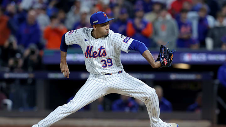 Oct 18, 2024; New York City, New York, USA; New York Mets relief pitcher Edwin Diaz (39) pitches against the Los Angeles Dodgers during the ninth inning of game five of the NLCS during the 2024 MLB playoffs at Citi Field. Mandatory Credit: Brad Penner-Imagn Images