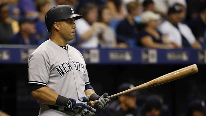 Jul 30, 2016; St. Petersburg, FL, USA; New York Yankees right fielder Carlos Beltran (36) on deck to bat against the Tampa Bay Rays at Tropicana Field. Mandatory Credit: Kim Klement-Imagn Images