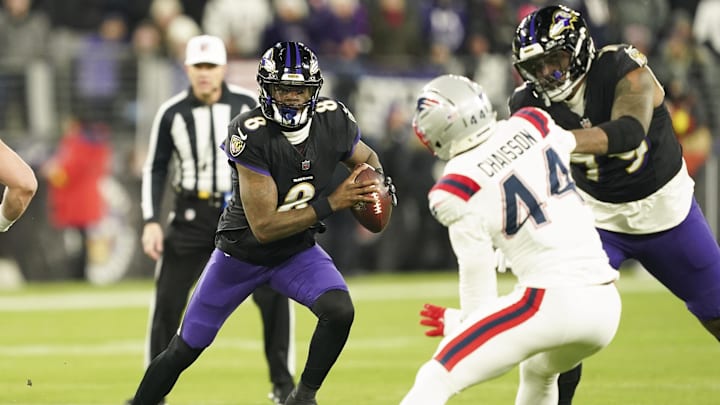 Lamar Jackson exited Sunday’s game vs. the Patriots with a back injury.