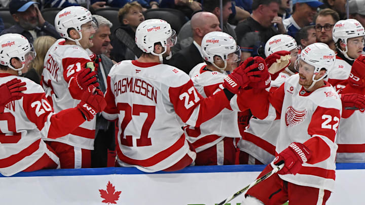 Oct 13, 2025; Toronto, Ontario, CAN; Detroit Red Wings center Mason Appleton (22) celebrates his goal against the Toronto Maple Leafs at the bench in the third period at Scotiabank Arena. Mandatory Credit: Gerry Angus-Imagn Images