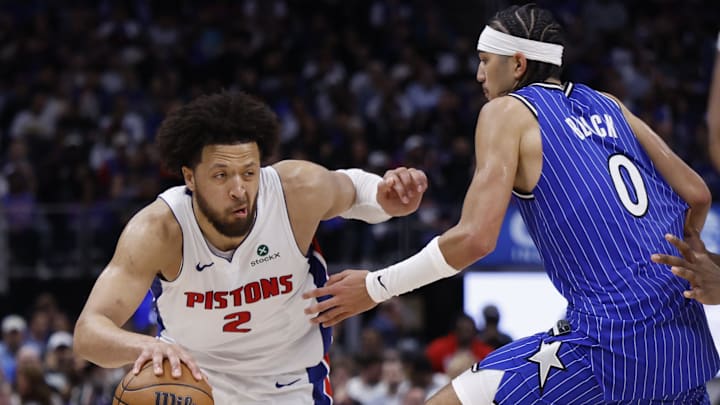 May 3, 2026; Detroit, Michigan, USA; Detroit Pistons guard Cade Cunningham (2) dribbles defended by Orlando Magic guard Anthony Black (0) in the second half during game seven of the first round of the 2026 NBA Playoffs at Little Caesars Arena. Mandatory Credit: Rick Osentoski-Imagn Images