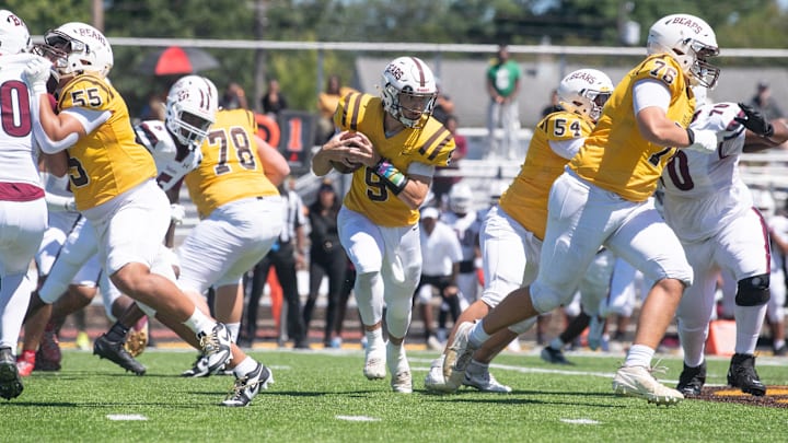 Delran's Vinny Sacca runs the ball during the Battle at the Beach football game between Delran and Bridgeton played at Rowan University in Glassboro on Saturday, August 30, 2025.