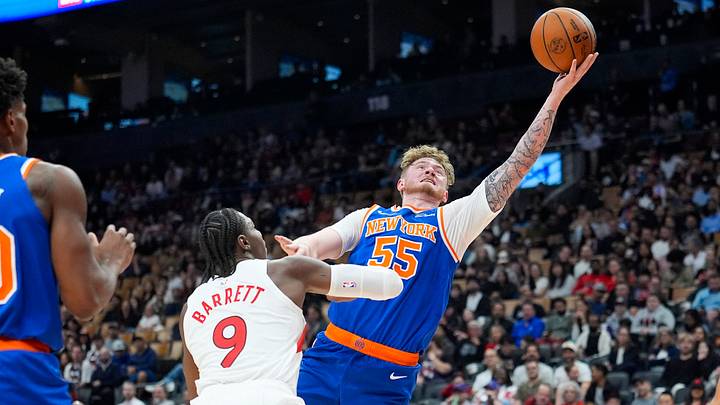 Oct 13, 2026; Toronto, Ontario, CAN; New York Knicks forward Tyler Nickel (55) goes up to make a basket against Toronto Raptors forward RJ Barrett (9) during the first half at Scotiabank Arena. Mandatory Credit: John E. Sokolowski-Imagn Images Oct 13, 2026; Toronto, Ontario, CAN; New York Knicks forward Tyler Nickel (55) goes up to make a basket against Toronto Raptors forward RJ Barrett (9) during the first half at Scotiabank Arena. Mandatory Credit: John E. Sokolowski-Imagn Images