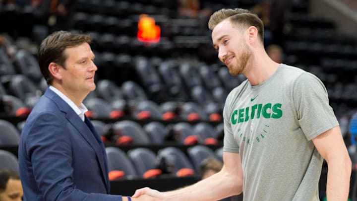 Nov 9, 2018; Salt Lake City, UT, USA; Utah Jazz general manager Dennis Lindsey (left) shakes hands with Boston Celtics forward Gordon Hayward (right) prior to a game at Vivint Smart Home Arena. Mandatory Credit: Russ Isabella-USA TODAY Sports