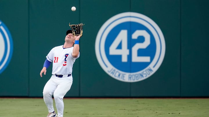 Dalton Rushing (21) catches the ball for an out during a baseball game between the Oklahoma City Baseball Club and the Round Rock Express at the Chickasaw Bricktown Ballpark in Oklahoma City. Dalton Rushing (21) catches the ball for an out during a baseball game between the Oklahoma City Baseball Club and the Round Rock Express at the Chickasaw Bricktown Ballpark in Oklahoma City.