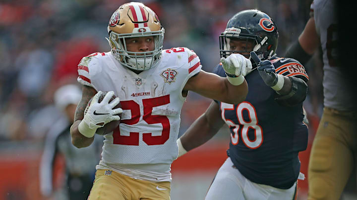 Oct 31, 2021; Chicago, Illinois, USA; San Francisco 49ers running back Eli Mitchell (25) runs past