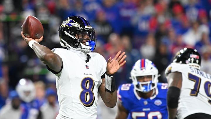 Sep 7, 2025; Orchard Park, New York, USA;  Baltimore Ravens quarterback Lamar Jackson (8) looks to pass during the fourth quarter against the Buffalo Bills at Highmark Stadium. Mandatory Credit: Mark Konezny-Imagn Images