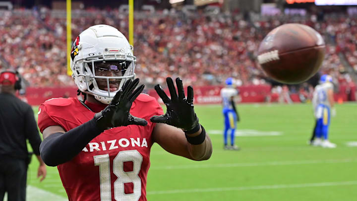 Sep 15, 2024; Glendale, Arizona, USA;  Arizona Cardinals wide receiver Marvin Harrison Jr. (18) catches a ball on the sideline in the first half against the Los Angeles Rams at State Farm Stadium. Mandatory Credit: Matt Kartozian-Imagn Images