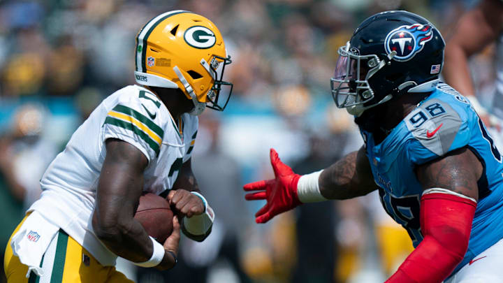Green Bay Packers quarterback Malik Willis (2) is sacked by Tennessee Titans defensive tackle Jeffery Simmons (98) during their game at Nissan Stadium in Nashville, Tenn., Sunday, Sept. 22, 2024.