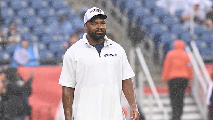 August 8, 2024; Foxborough, MA, USA;  New England Patriots head coach Jerod Mayo  watches as the team warms up before a game against the Carolina Panthers at Gillette Stadium. Mandatory Credit: Eric Canha-USA TODAY Sports