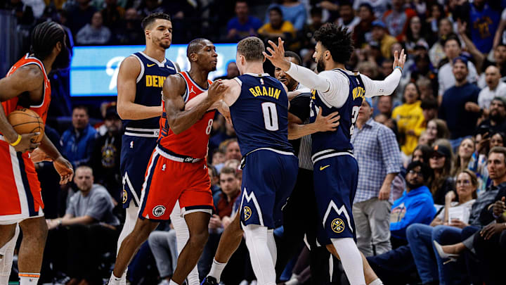 Apr 21, 2025; Denver, Colorado, USA; Denver Nuggets guard Jamal Murray (27) reacts after a play with Los Angeles Clippers guard Norman Powell (24) as guard Kris Dunn (8) and guard Christian Braun (0) push each other as forward Michael Porter Jr. (1) looks on in the third quarter during game two of first round for the 2025 NBA Playoffs at Ball Arena. Mandatory Credit: Isaiah J. Downing-Imagn Images Apr 21, 2025; Denver, Colorado, USA; Denver Nuggets guard Jamal Murray (27) reacts after a play with Los Angeles Clippers guard Norman Powell (24) as guard Kris Dunn (8) and guard Christian Braun (0) push each other as forward Michael Porter Jr. (1) looks on in the third quarter during game two of first round for the 2025 NBA Playoffs at Ball Arena. Mandatory Credit: Isaiah J. Downing-Imagn Images