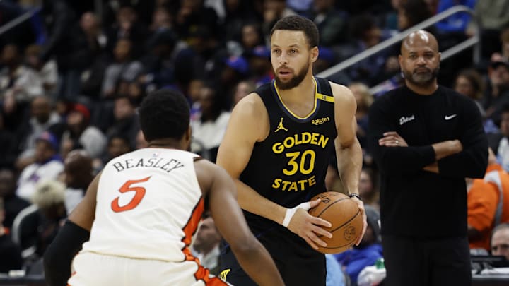 Jan 9, 2025; Detroit, Michigan, USA;  Golden State Warriors guard Stephen Curry (30) with the ball against Detroit Pistons guard Malik Beasley (5) in the second half at Little Caesars Arena. Mandatory Credit: Rick Osentoski-Imagn Images