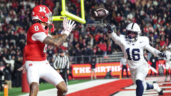 Nov 29, 2025; Piscataway, New Jersey, USA; Rutgers Scarlet Knights wide receiver KJ Duff (8) catches a two point conversion in front of Penn State Nittany Lions safety King Mack (16) during the second half at SHI Stadium. Mandatory Credit: Vincent Carchietta-Imagn Images