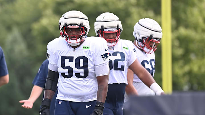 Aug 03, 2024; Foxborough, MA, USA; New England Patriots offensive tackle Vederian Lowe (59) waits to do a drill during training camp at Gillette Stadium. Mandatory Credit: Eric Canha-Imagn Images