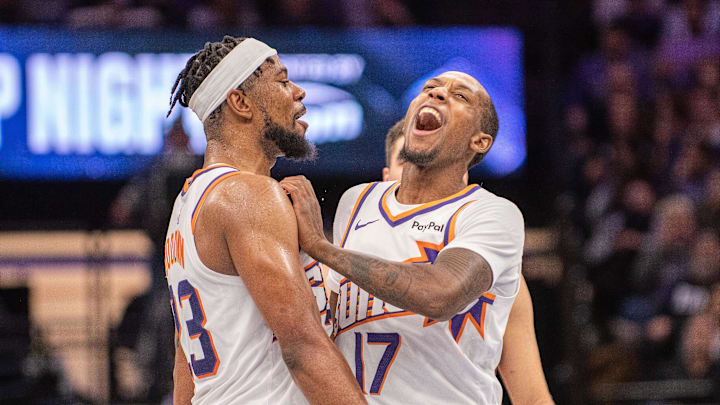Nov 26, 2025; Sacramento, California, USA; Phoenix Suns guard Jamaree Bouyea (17) celebrates with guard Jordan Goodwin (23) after making a three point shot during the fourth quarter of the game against the Sacramento Kings at Golden 1 Center. Mandatory Credit: Ed Szczepanski-Imagn Images