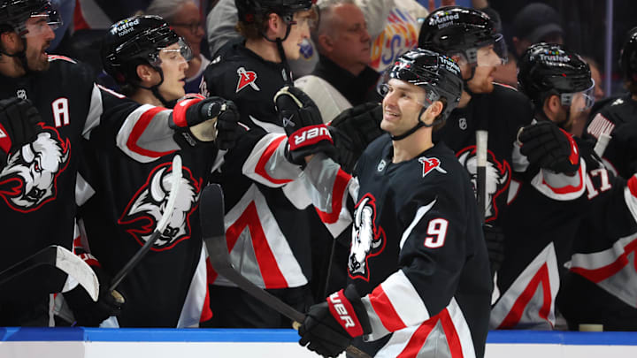 Apr 6, 2026; Buffalo, New York, USA;  Buffalo Sabres center Josh Norris (9) celebrates his goal with teammates during the first period against the Tampa Bay Lightning at KeyBank Center. Mandatory Credit: Timothy T. Ludwig-Imagn Images