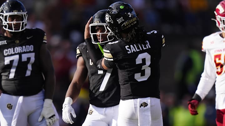 Oct 11, 2025; Boulder, Colorado, USA; Colorado Buffaloes running back Dallan Hayden (7) and quarterback Kaidon Salter (3) celebrate a first down in the against the Iowa State Cyclones at Folsom Field. Mandatory Credit: Ron Chenoy-Imagn Images