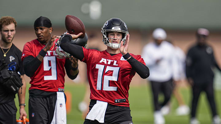 Jul 24, 2025; Flowery Branch, GA, USA; Atlanta Falcons quarterback Easton Stick (12) passes the ball during training camp at IBM Performance Field. Mandatory Credit: Dale Zanine-Imagn Images