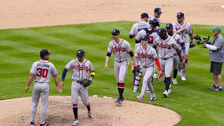 May 3, 2026; Denver, Colorado, USA; Members of the Atlanta Braves celebrate defeating the Colorado Rockies at Coors Field. Mandatory Credit: Ron Chenoy-Imagn Images