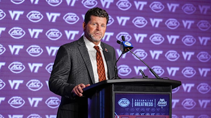 Jul 23, 2024; Charlotte, NC, USA; Virginia Tech head coach Brent Pry answers questions from the media during the ACC Kickoff at Hilton Charlotte Uptown. Mandatory Credit: Jim Dedmon-USA TODAY Sports