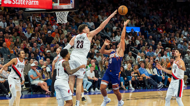 Nov 2, 2024; Phoenix, Arizona, USA;  Phoenix Suns guard Grayson Allen (8) floats his shots just past over Portland Trail Blazers center Donovan Clingan (23) in the second half during a game at Footprint Center. Mandatory Credit: Allan Henry-Imagn Images