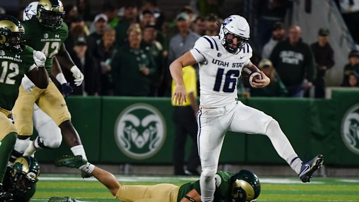 Oct 15, 2022; Fort Collins, Colorado, USA; Utah State Aggies quarterback Levi Williams (16) can't