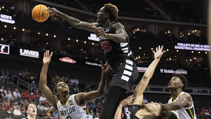 Mar 14, 2024; Kansas City, MO, USA; Cincinnati Bearcats forward Aziz Bandaogo (55) blocks a shot by Baylor Bears guard Jayden Nunn (2) during the second half at T-Mobile Center. Mandatory Credit: Amy Kontras-Imagn Images Mar 14, 2024; Kansas City, MO, USA; Cincinnati Bearcats forward Aziz Bandaogo (55) blocks a shot by Baylor Bears guard Jayden Nunn (2) during the second half at T-Mobile Center. Mandatory Credit: Amy Kontras-Imagn Images