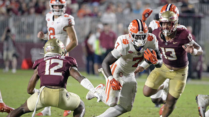 Oct 5, 2024; Tallahassee, Florida, USA; Clemson Tigers running back Phil Mafah (7) runs up the field against the Florida State Seminoles during the second half at Doak S. Campbell Stadium.