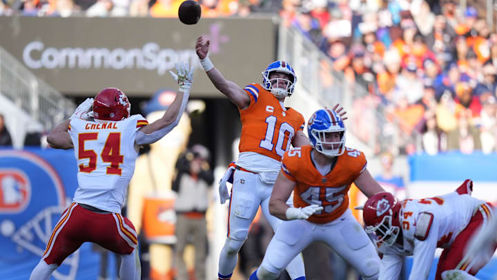  Denver Broncos quarterback Bo Nix (10) passes the ball in the first quarter against the Kansas City Chiefs at Empower Field at Mile High.