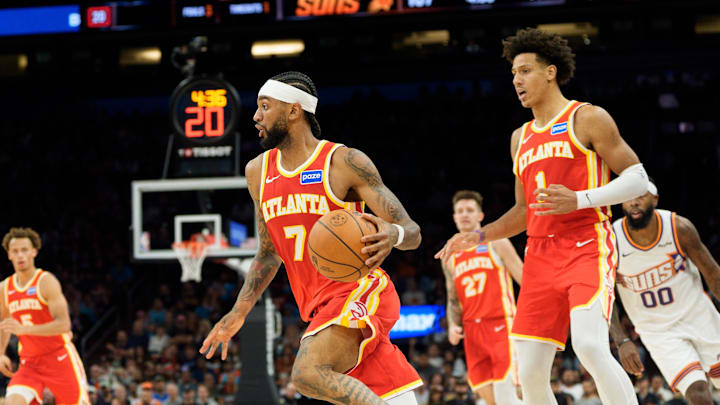 Nov 16, 2025; Phoenix, Arizona, USA; Atlanta Hawks guard Nickeil Alexander-Walker (7) drives against the Phoenix Suns during the second half of play at Mortgage Matchup Center. Mandatory Credit: Allan Henry-Imagn Images Nov 16, 2025; Phoenix, Arizona, USA; Atlanta Hawks guard Nickeil Alexander-Walker (7) drives against the Phoenix Suns during the second half of play at Mortgage Matchup Center. Mandatory Credit: Allan Henry-Imagn Images