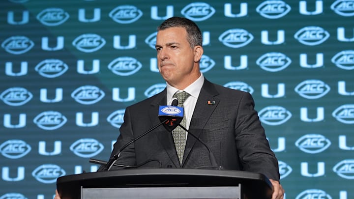 Jul 24, 2024; Charlotte, NC, USA;  Miami Hurricanes head coach Mario Cristobal speaks to the media during the ACC Kickoff at Hilton Charlotte Uptown. Mandatory Credit: Jim Dedmon-USA TODAY Sports