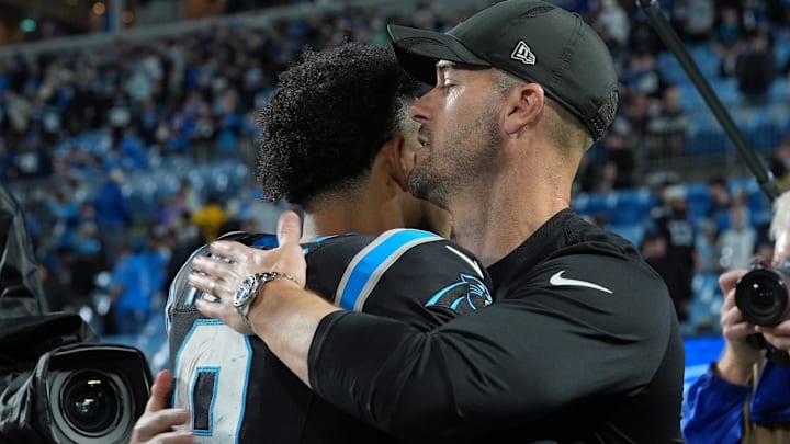 Jan 10, 2026; Charlotte, NC, USA; Carolina Panthers head coach Dave Canales and quarterback Bryce Young (9)) react after the game in the NFC Wild Card Round game at Bank of America Stadium. Mandatory Credit: Jim Dedmon-Imagn Images Jan 10, 2026; Charlotte, NC, USA; Carolina Panthers head coach Dave Canales and quarterback Bryce Young (9)) react after the game in the NFC Wild Card Round game at Bank of America Stadium. Mandatory Credit: Jim Dedmon-Imagn Images