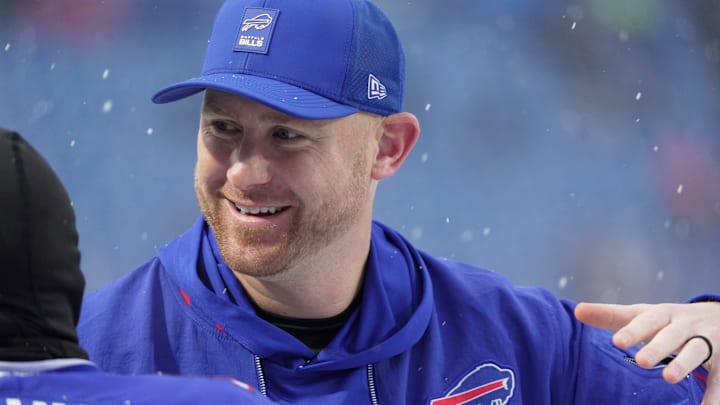 Buffalo Bills offensive coordinator Joe Brady greets players as they take the field before their game against the Bengals at Highmark Stadium in Orchard Park on Dec. 7, 2025.