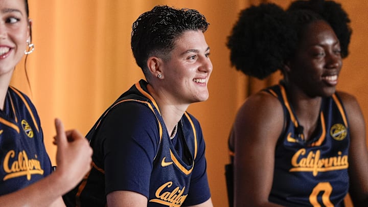 Ioanna Krimili, center, smiles alongside her Cal teammates