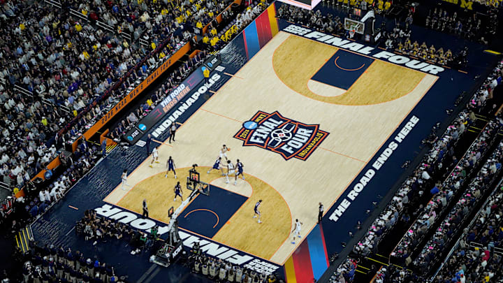Michigan Wolverines forward Yaxel Lendeborg (23) looks for space Monday, April 6, 2026, against the UConn Huskies during the NCAA men's basketball tournament national championship game at Lucas Oil Stadium in Indianapolis.