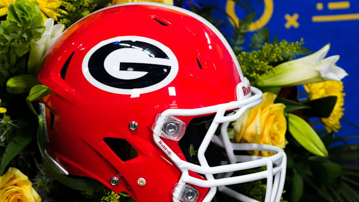 Dec 6, 2025; Atlanta, GA, USA; A Georgia football helmet is displayed on a TV set at Mercedes-Benz Stadium. Mandatory Credit: Gary Cosby Jr.-Tuscaloosa News