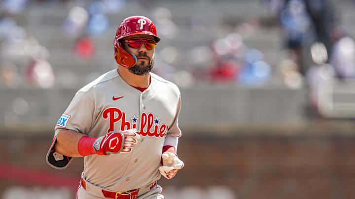 Apr 26, 2026; Cumberland, Georgia, USA; Philadelphia Phillies left fielder Kyle Schwarber (12) reacts as he runs the bases after hitting a home run against the Atlanta Braves during the eighth inning at Truist Park. Mandatory Credit: Dale Zanine-Imagn Images