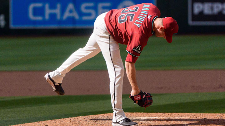 Mar 30, 2025; Phoenix, Arizona, USA; Arizona Diamondbacks pitcher Joe Mantiply (35) on the mound to start the top of the seventh inning against the Chicago Cubs at Chase Field. Mandatory Credit: Allan Henry-Imagn Images Mar 30, 2025; Phoenix, Arizona, USA; Arizona Diamondbacks pitcher Joe Mantiply (35) on the mound to start the top of the seventh inning against the Chicago Cubs at Chase Field. Mandatory Credit: Allan Henry-Imagn Images