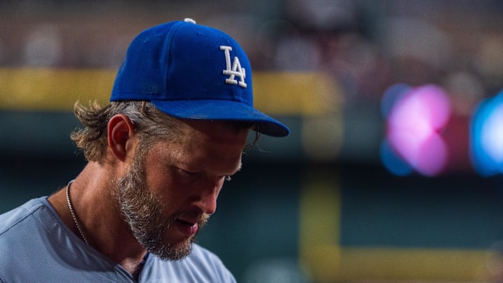 Aug 30, 2024; Phoenix, Arizona, USA;  Los Angeles Dodgers pitcher Clayton Kershaw (22) reacts after pitching change in the second inning during a game against the Arizona Diamondbacks at Chase Field. Mandatory Credit: Allan Henry-Imagn Images
