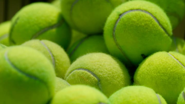 April 8, 2026; Tuscaloosa, AL, USA; Tennis balls wait in a cart for a practice session.