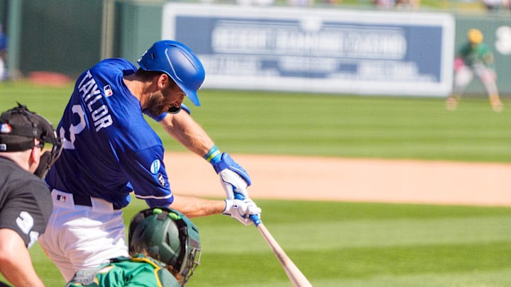 Los Angeles Dodgers outfielder Chris Taylor (3) singles on a ground ball to right field in the bottom of the seventh during a spring training game between the Oakland Athletics at Camelback Ranch-Glendale on March 9.